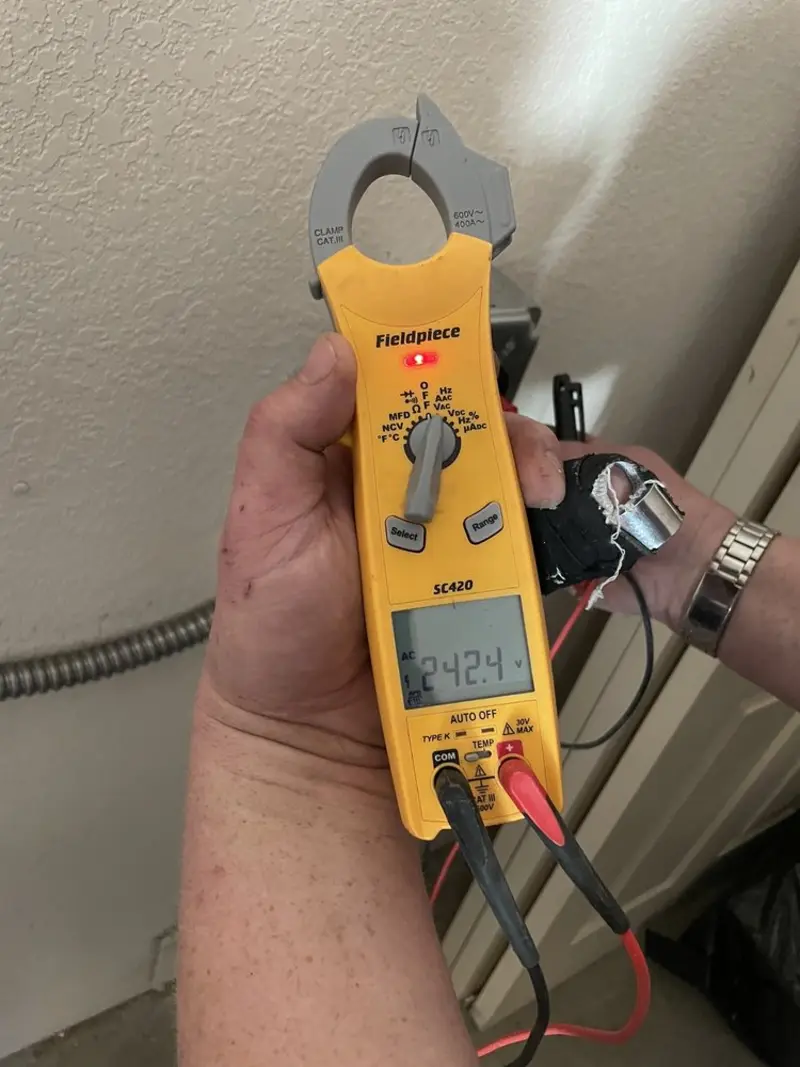 Voltage testing with clamp meter during Generator Installation in North Port